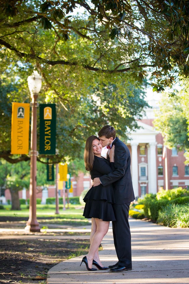 Allison's engagement Baylor University on the walkway kissing