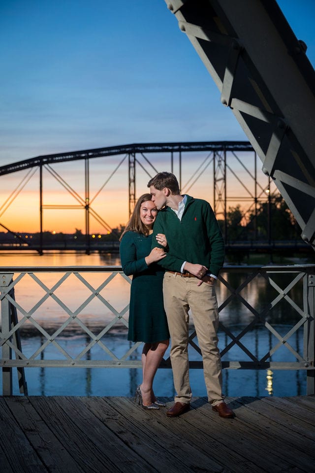 Allison's engagement Baylor University on the bridge in Waco him kissing her