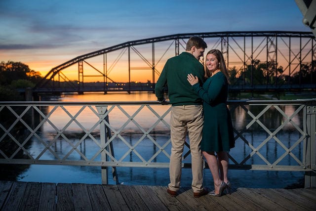 Allison's engagement Baylor University on the bridge in Waco looking at water