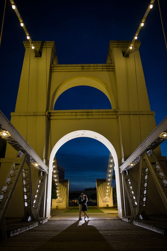 Allison's engagement Baylor University on the bridge in Waco night on bridge with mast