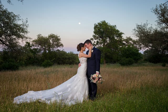 Amberlynn's wedding at The Milestone New Braunfels couple portrait with the moon