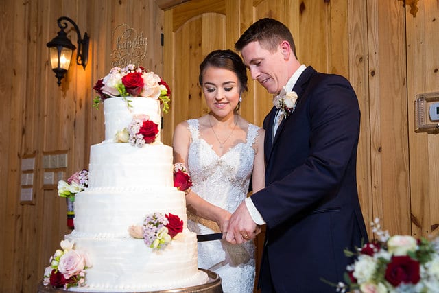 Amberlynn's wedding at The Milestone New Braunfels reception cake cutting
