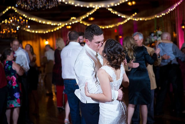 Amberlynn's wedding at The Milestone New Braunfels reception couple kissing