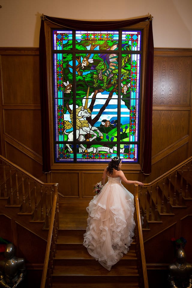 Emilia's Bridal in the ballroom at Castle Avalon on the full staircase