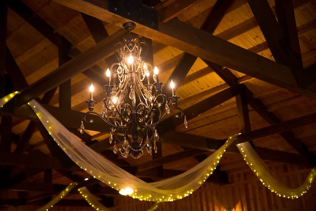 Emilia and John wedding The Milestone Boerne reception chandelier