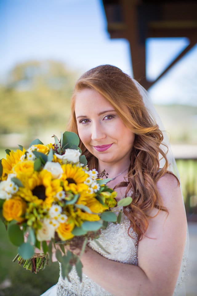 Jamie's Bridal at the Milestone in Boerne close up portrait with flowers