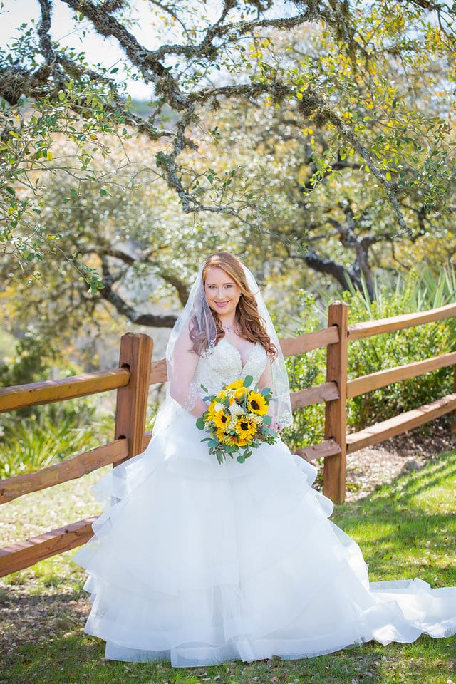 Jamie's Bridal at the Milestone in Boerne portrait by the fence