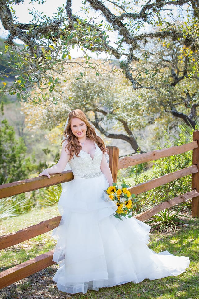 Jamie's Bridal at the Milestone in Boerne portrait by the fence looking down