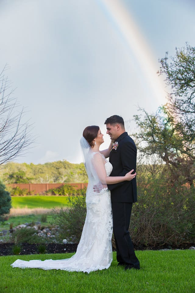 Katie Z wedding at tThe Milestone New Braunfels the bride and groom with rainbow portrait
