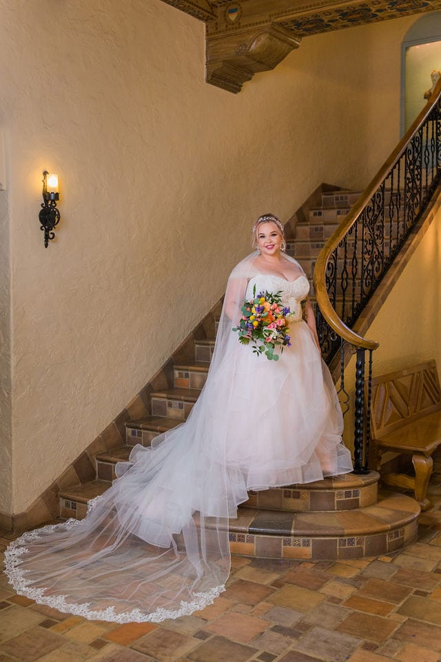 Katie's Bridal session at the McNay posed on the stair case