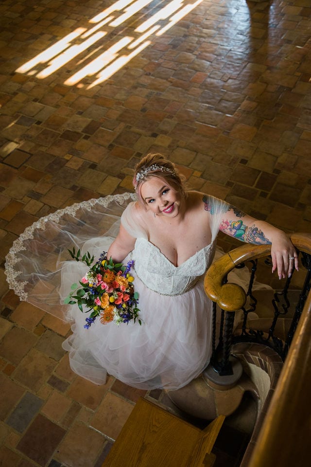 Katie's Bridal session at the McNay posed under the stair case