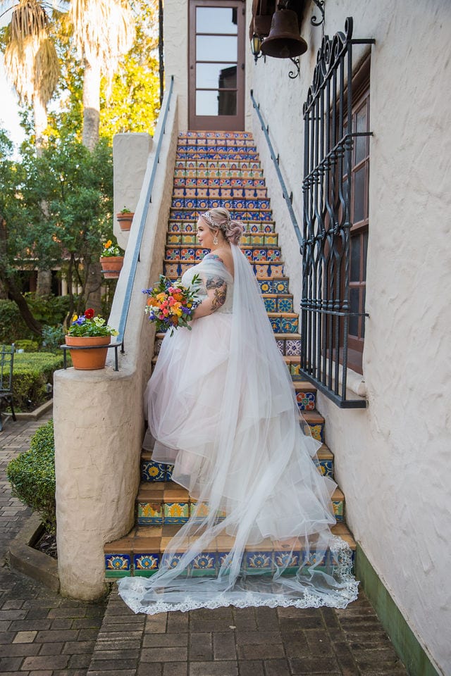 Katie's Bridal session at the McNay looking out on the tile stair case