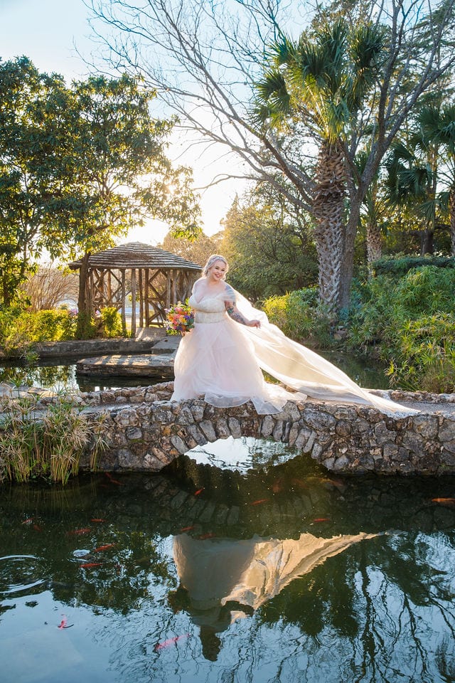 Katie's Bridal session at the McNay stone bridge with water