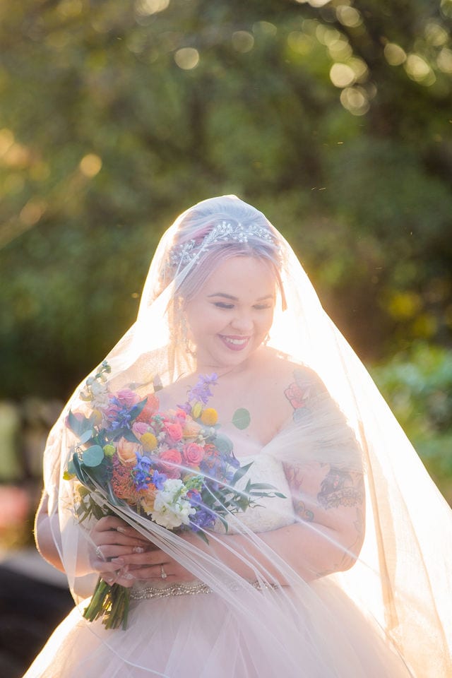 Katie's Bridal session at the McNay on the bridge with the veil over