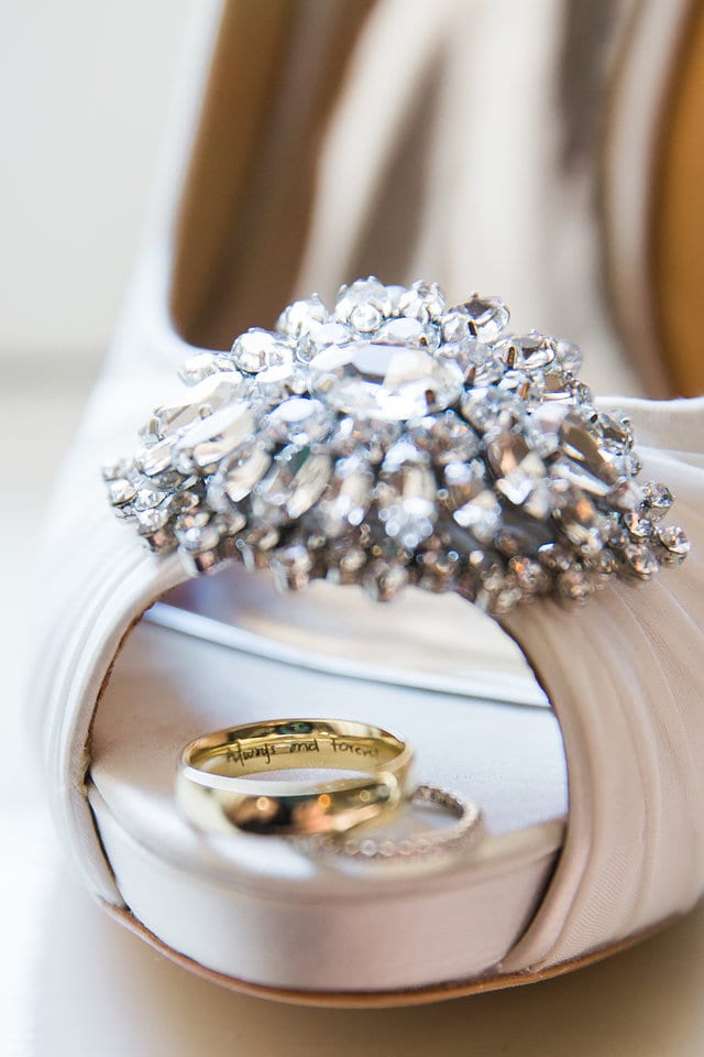 Kimb wedding details ring and shoes in bowl at Hotel Emma