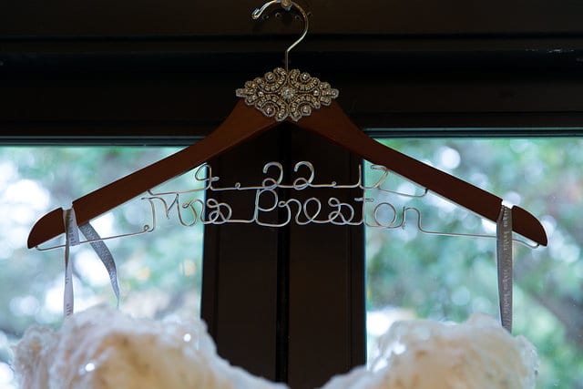 Megan and Neil's Wedding Club of Sonterra dress hanger