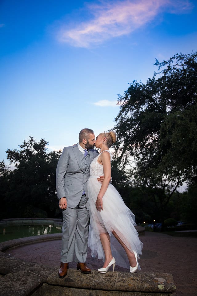 Nick and Liz wedding couple portraits at the McNay Art Museum at sunset by fountain