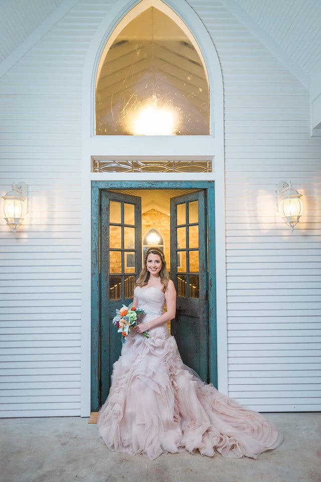Victoria's bridal at The Chandelier of Gruene bride in the chapel doors close up