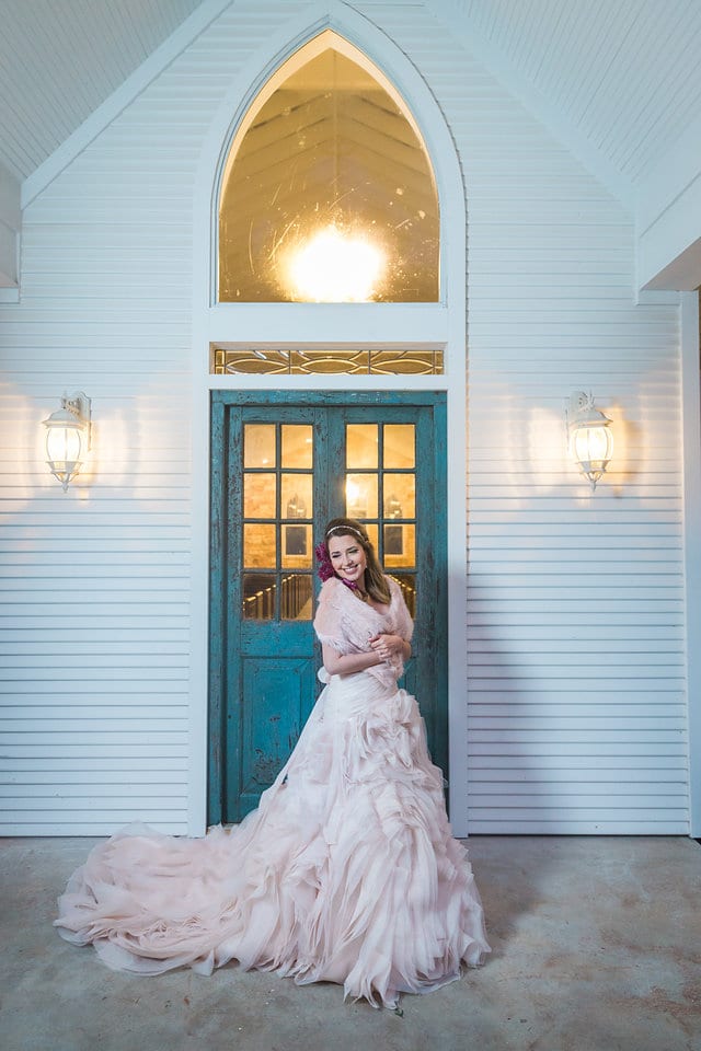 Victoria's bridal at The Chandelier of Gruene bride in the chapel doors with fur