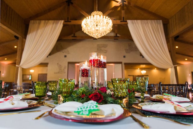 Styled shoot Chandelier of Gruene Christmas greenery on the table