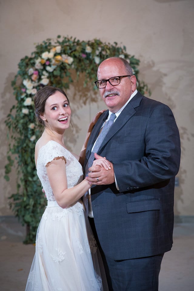 Brides dance with dad at the wedding