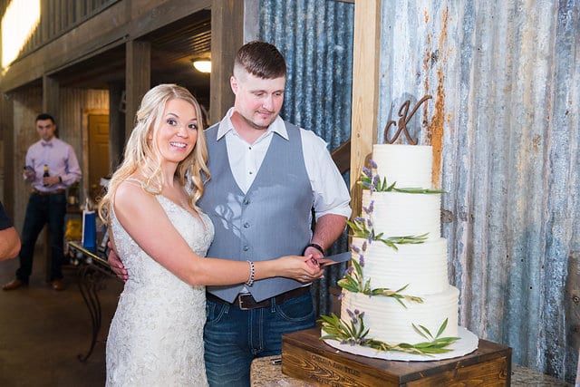 Chelsea and Tyler's Wedding, bride and groom cake cutting