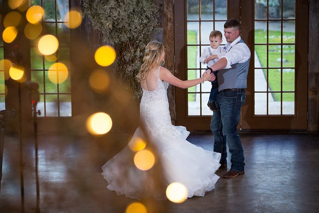 Chelsea and Tyler's Wedding, Bride and Groom dancing with son