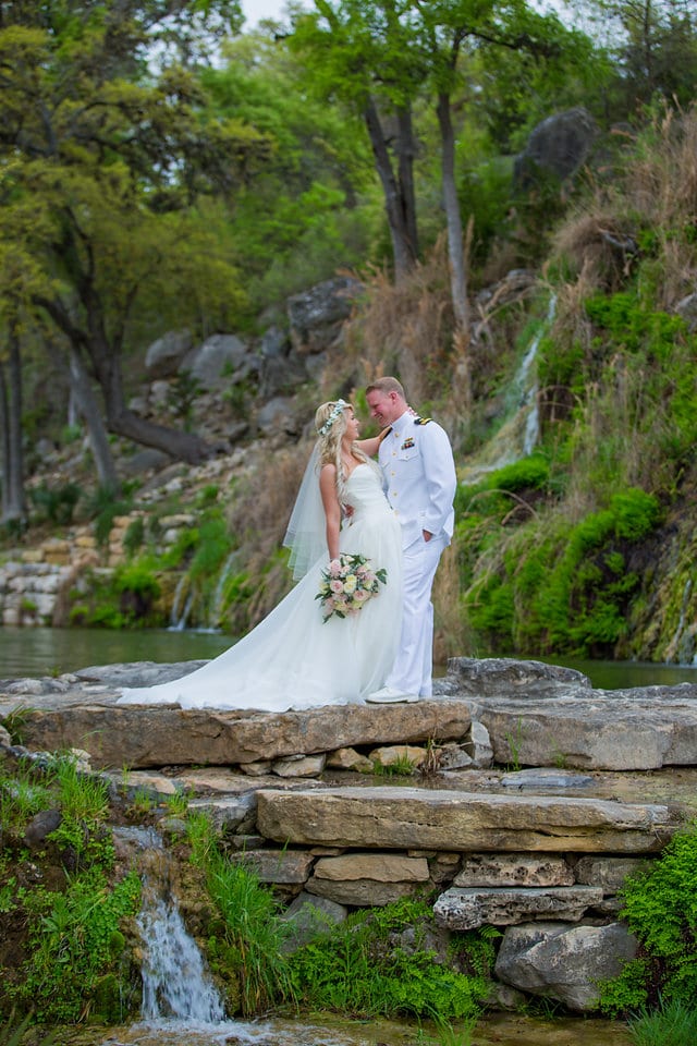 Lisa and Clinton's wedding Hidden Falls couple on the falls
