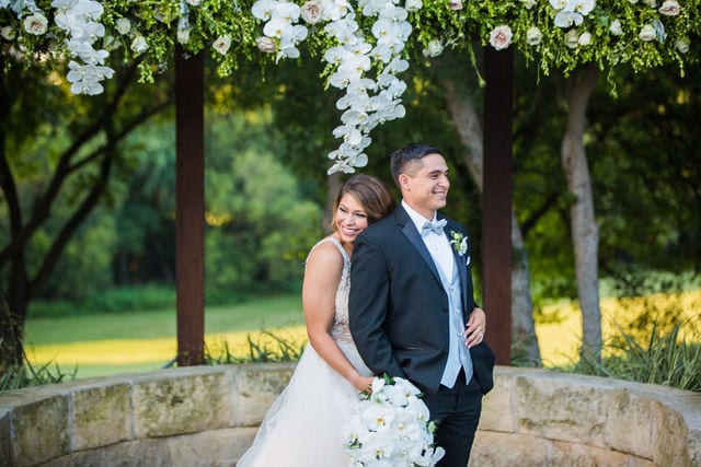 Styled wedding shoot at Olympia Hills San Antonio bride and groom at the ceremony site hugging