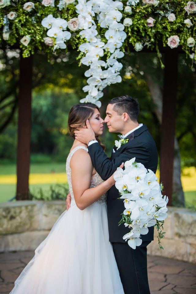 Styled wedding shoot at Olympia Hills San Antonio bride and groom at the ceremony site romantic