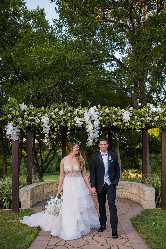 Styled wedding shoot at Olympia Hills San Antonio bride and groom on aisle