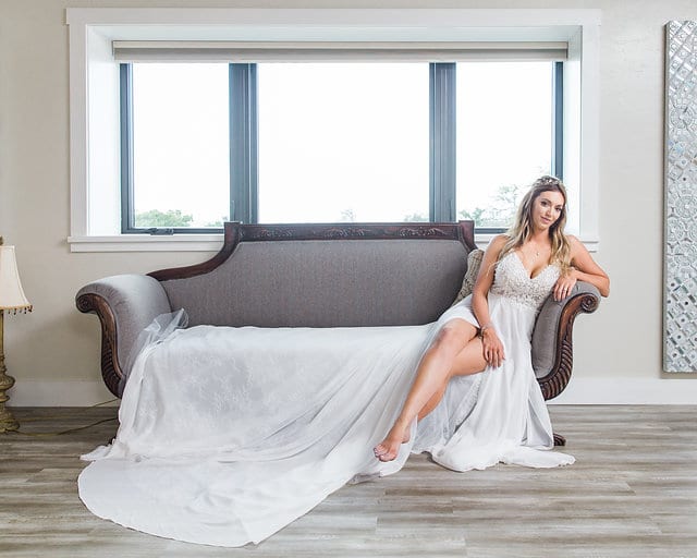 Rafter E Venue styled shoot Bride on Sofa