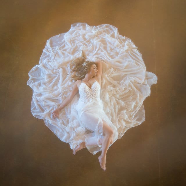 Rafter E Venue styled shoot Bride on the ground