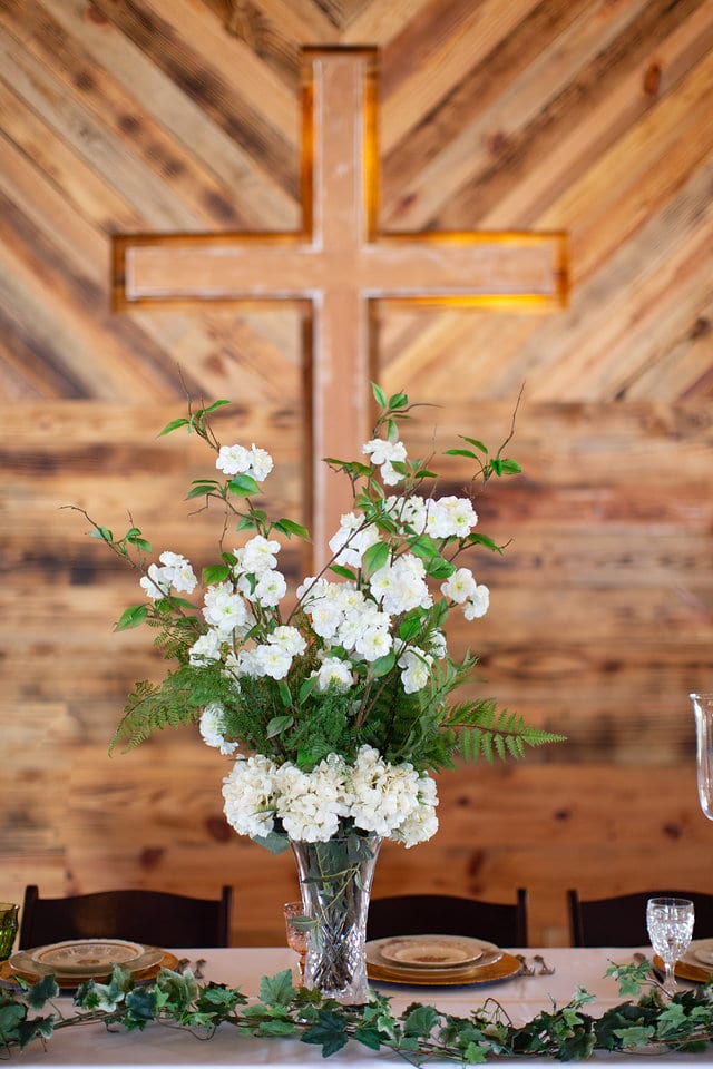 Rafter E Venue styled shoot head table centerpiece