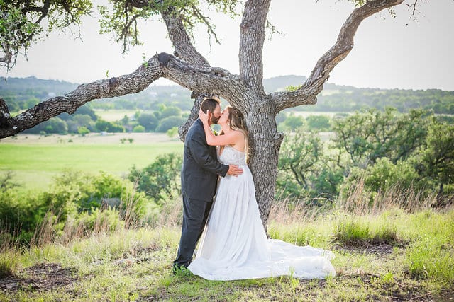 Rafter E Venue styled shoot kiss by tree