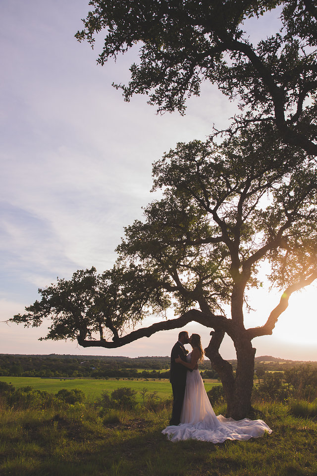 Rafter E Venue styled shoot under the tree with the sunset