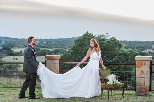 Rafter E Venue styled shoot bride and groom at chair