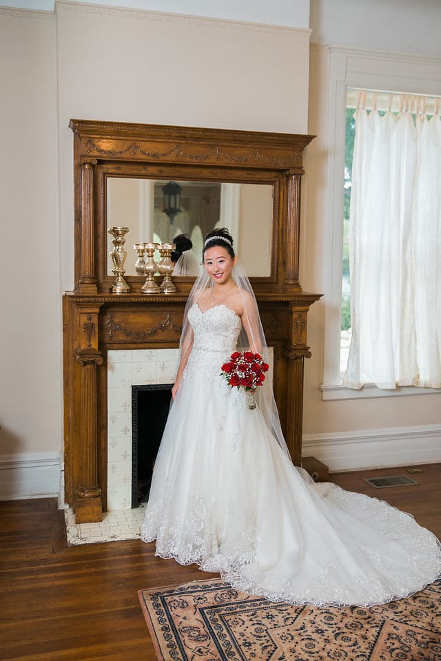 Sarah in front of the mantel for Wedding Portraits