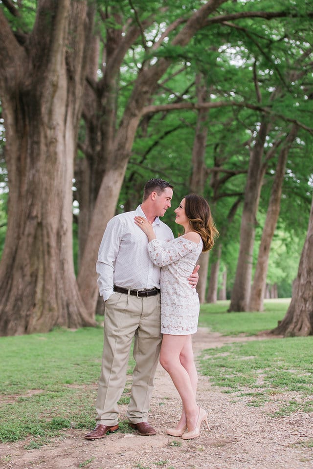 Grisham engagement portrait, the couple in the trees