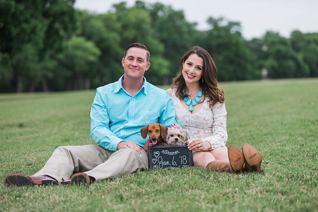 Grisham engagement with date sign and dogs
