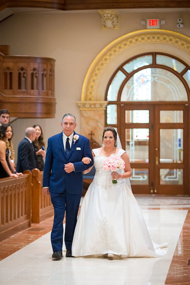 Anette with dad walking down the aisle University of the Incarnate Word