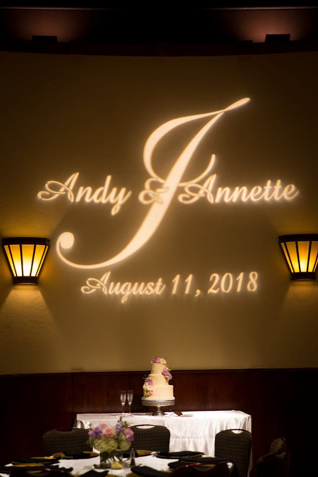 Annette and Andy gobo in the ballroom of the Pearl Stable