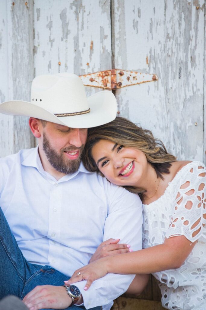 Kleiman engagement in Gruene on the white wall sitting