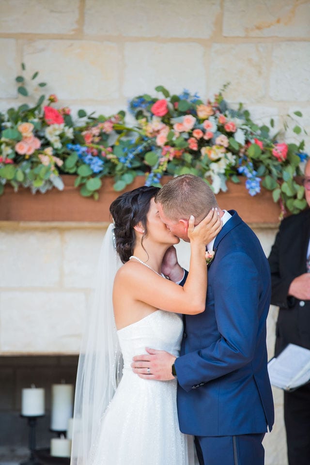 Edwards Wedding ceremony kiss at Milestone, New Braunfels