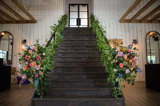 Katie C wedding the MIlestone staircase floral