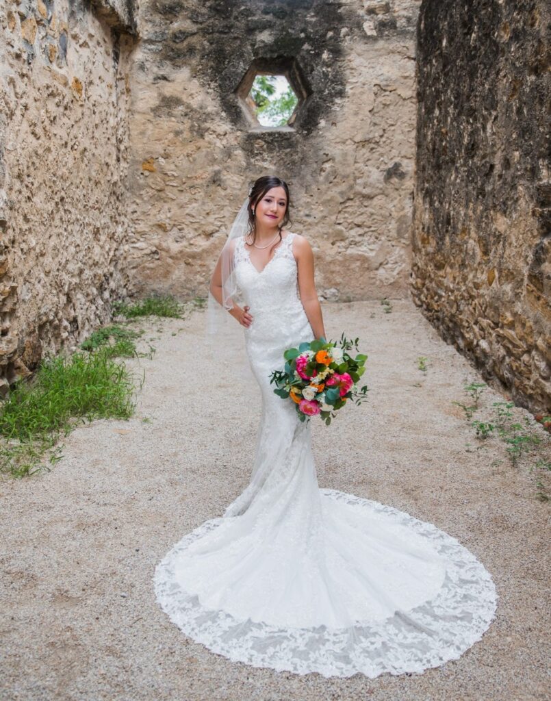 Gaby Bridal at Mission San Jose portrait in the walkway