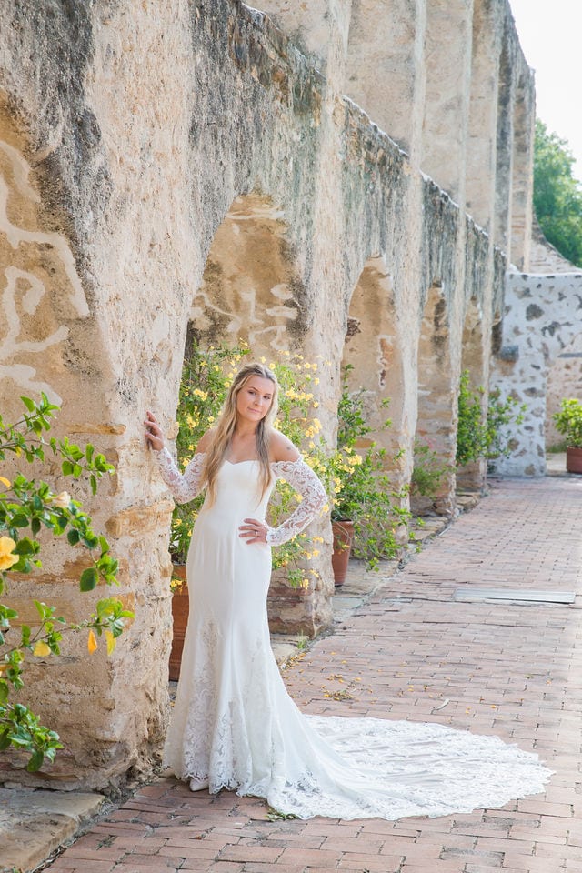 Kelsey's bridal at Mission San Jose outside arches