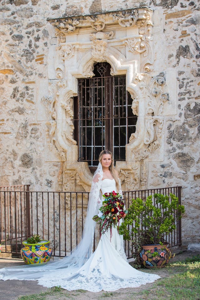 Kelsey's bridal at Mission San Jose outside rose window