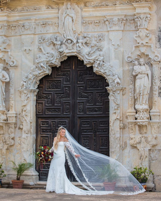 Kelsey's bridal at Mission San Jose large doors with the veil