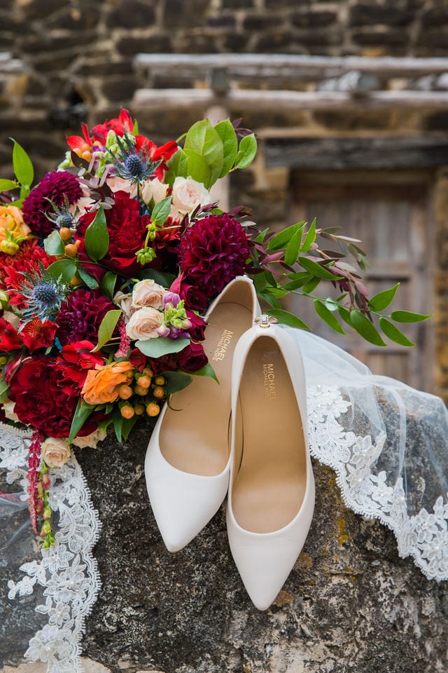 Kelsey's bridal at Mission San Jose shoes, rings, and bouquet